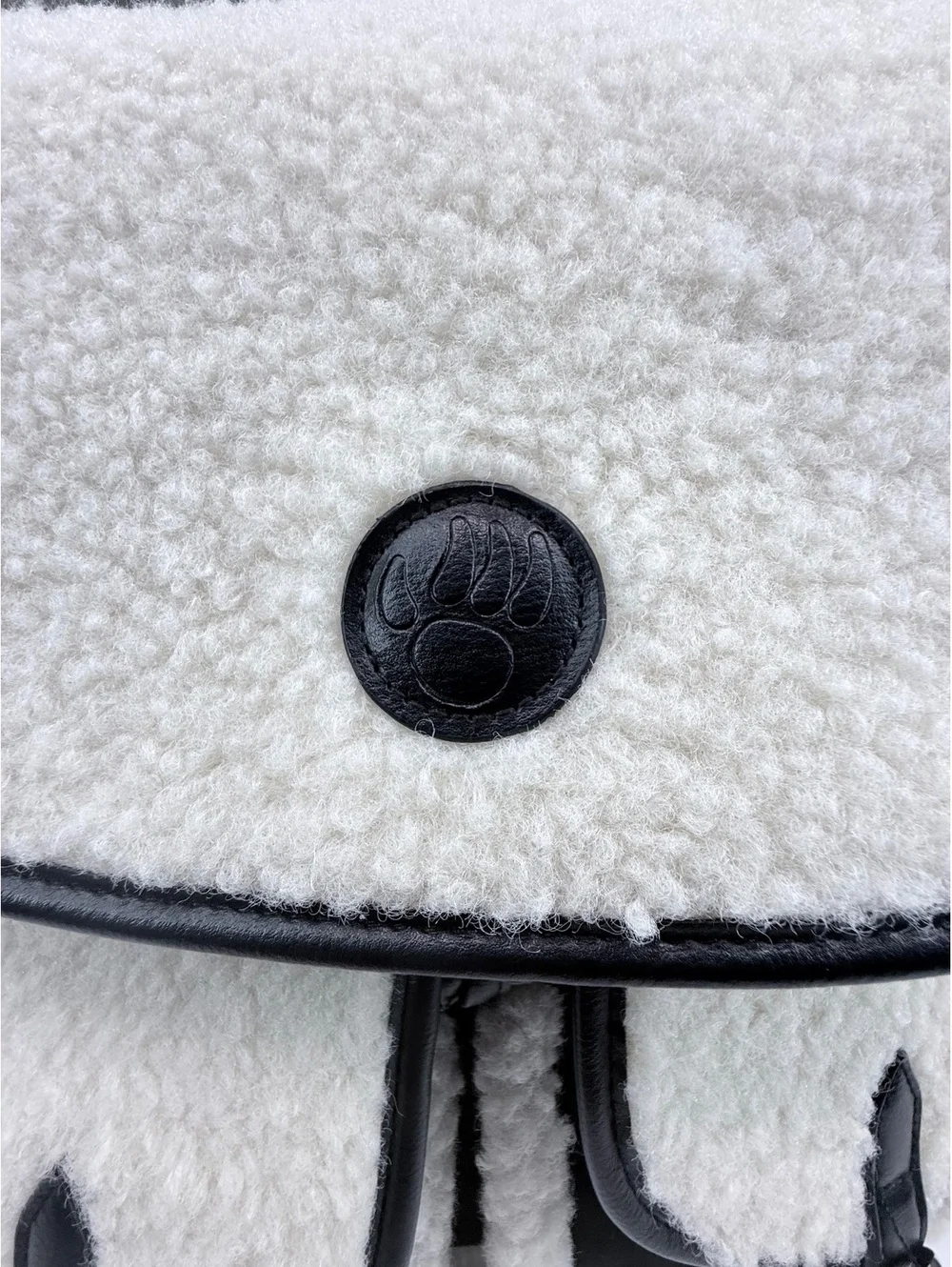 Bearpaw Black and White Sherpa Faux Leather Backpack